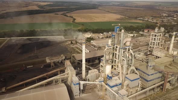 Aerial view of cement plant factory at industrial production area.