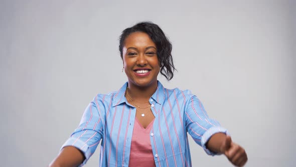 Happy African American Woman Showing Thumbs Up 12