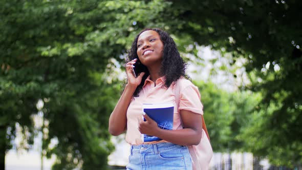 African Student Girl Calling on Smartphone in City