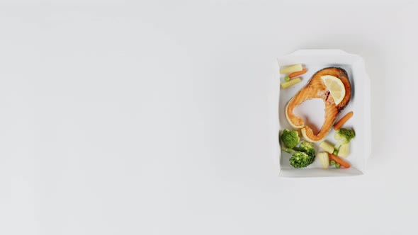 Food Delivery Top View Take Away Meals in Disposable Containers on White Background