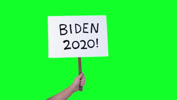 2020 Election Signs Held Up By Hand