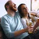 Beautiful Couple in Love Watching Tv and Drinking - VideoHive Item for Sale