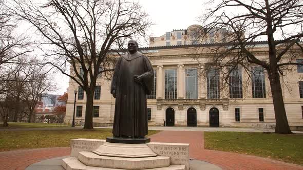 Statue of William Oxley Thompson on the campus of Ohio State University in front of the Thompson Lib