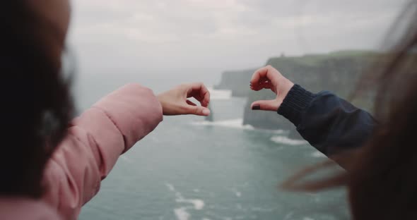 Two Young Ladies on the Top of Cliffs