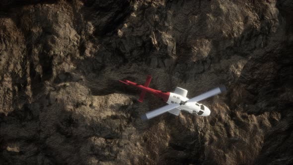 Slow Motion Helicopter Above Rocky Desert