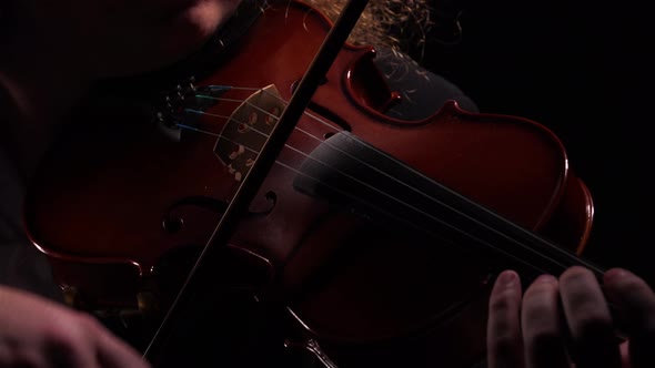 Detailed Footage of Violinist Playing Classical Wooden Violin