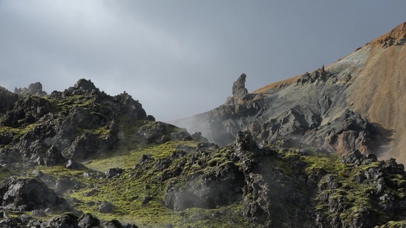 Environment. Iceland. Geyser in famous tourist attraction. Steam from fumarole in geothermal area.