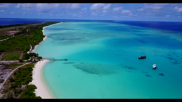 Aerial sky of marine island beach lifestyle by blue lagoon and white sand background of adventure ne