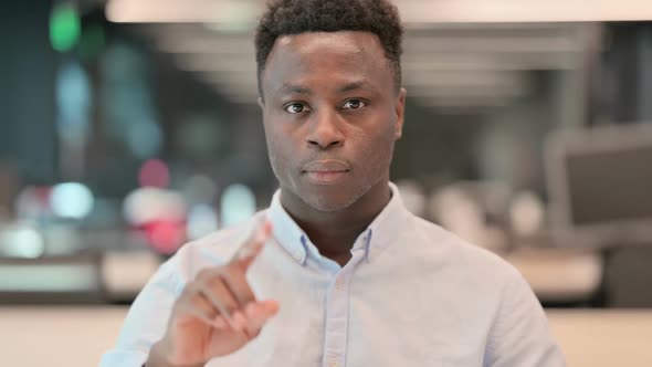 Portrait of No Sign By African Businessman By Finger Shake