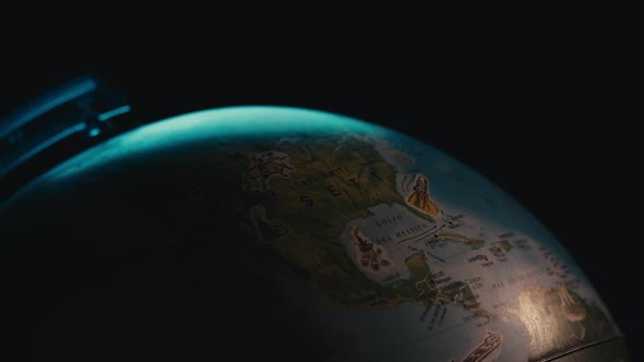 Globe Illuminated By the Passage of the Sun