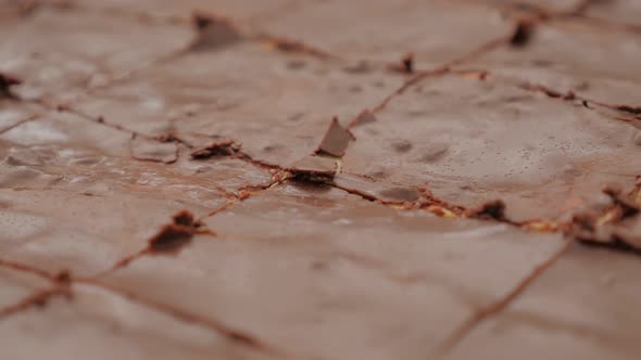 Glazed  and cracked chocolate cake surface close-up 4K 2160p 30fps UltraHD footage - Tasty looking  