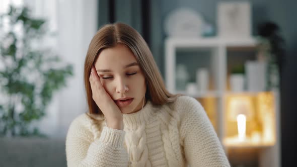 Woman Feeling Tired Because of Studying at Home