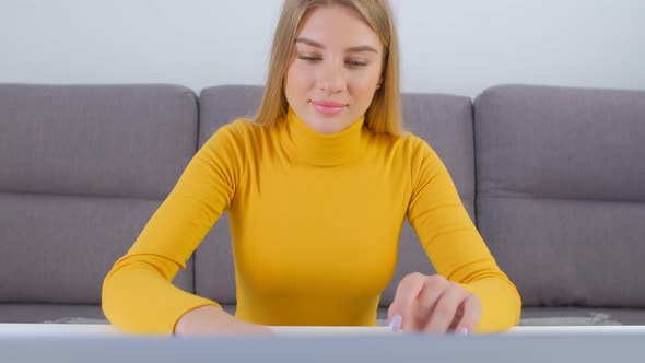 Freelancer female working on notebook computer at home on lockdown in 4k video
