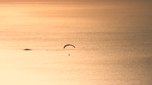 Paragliders Flying With Paragliding in Sky Over the Forest, Mountain Top and Sea