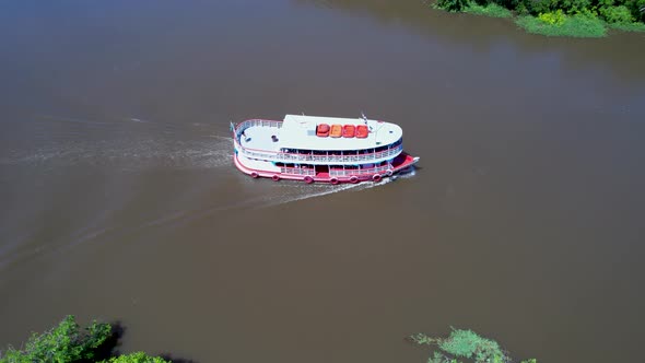 Boat sailing at Amazon River at Amazon Rainforest. Manaus Brazil.