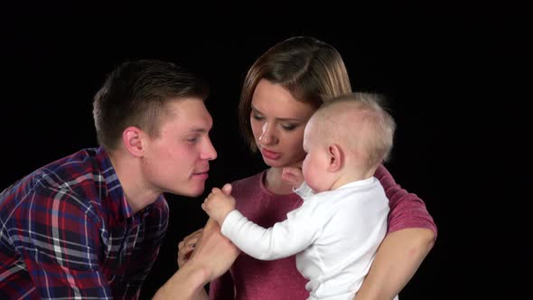 Portrait of Mother, Father and Baby Girl, Black