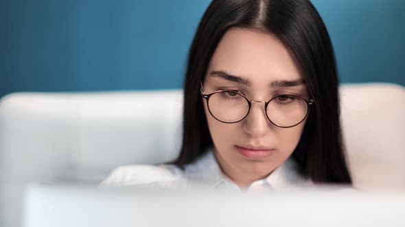 Closeup Focused Businesswoman in Glasses Working Use Laptop