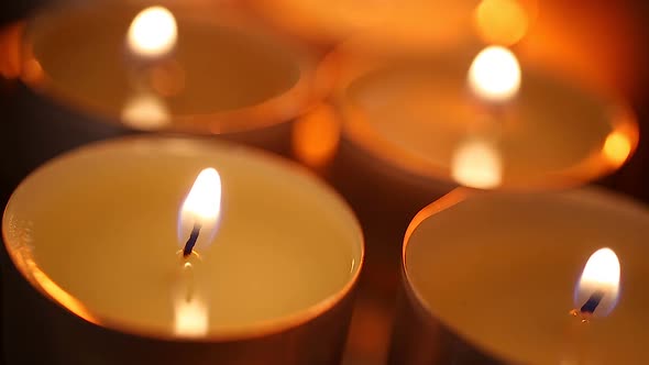 Romantic Atmosphere With Scented Aroma Candles Burning in Red Light Room, Date