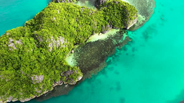 Rocky Island with Rainforest, Aerial View . Caramoan Islands, Philippines.