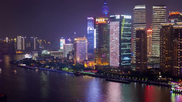 Shanghai River Urban Cityscape Aerial Skyline Panorama Timelapse at Night Zoom Out