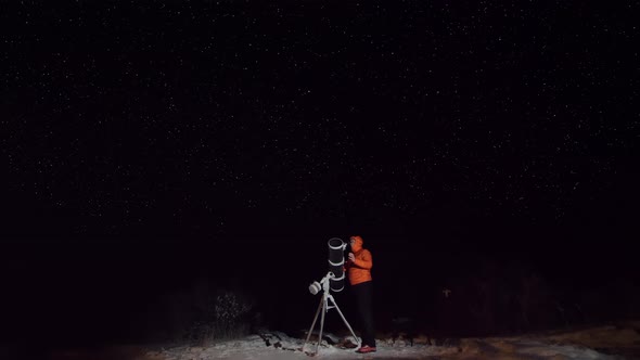 Experienced Amateur Astronomer Adjusts His Professional Large Newtonian Reflecting Telescope