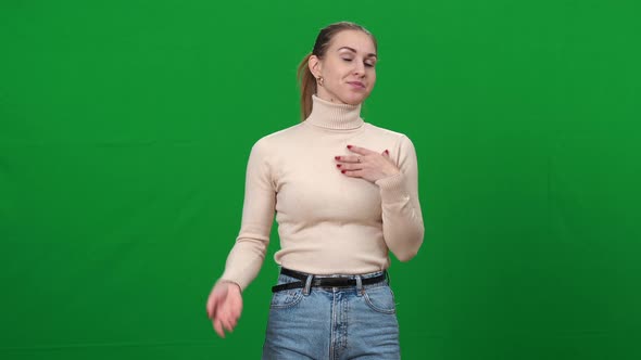 Shocked Young Woman Excusing Herself at Chromakey Background