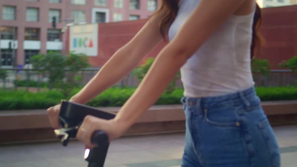 Cute Girl Use Electric Bike Watching Architecture