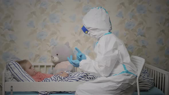 Doctor with patient during quarantine at home