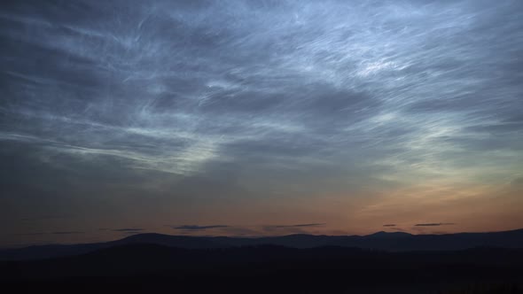 Noctilucent Clouds Shining in Summer Night Sky Timelapse
