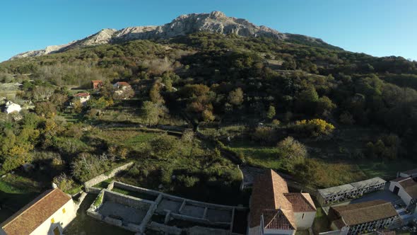 Mountains and an old church, aerial view