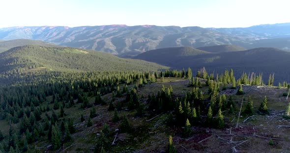 This drone flight over the Rocky Mountains of Colorado unveils a beautiful vista and pine forests.