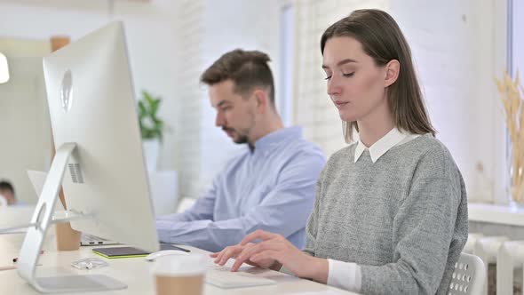 Ambitious Creative Woman Showing Thumbs Up in Office