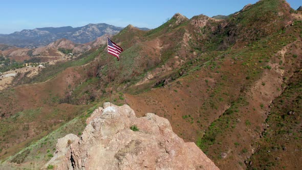 Beautiful Drone Shot Around of the USA Banner Set on Sunny Summer Day 