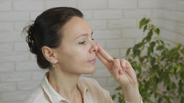 Woman Exhaling Nose Exercises