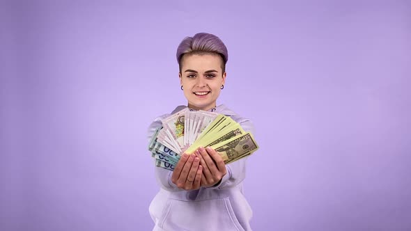 Woman Tossing Banknotes Up Rejoicing Boasting Money Profit Indoors