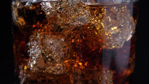 Fizzling Cola in the Glass