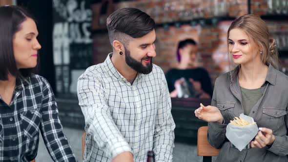 Adorable Young European Friend Talking Smiling Having Positive Emotion Enjoying Party at Loft Pub