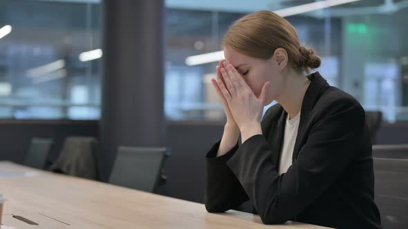 Upset Woman Feeling Angry While Sitting in Office