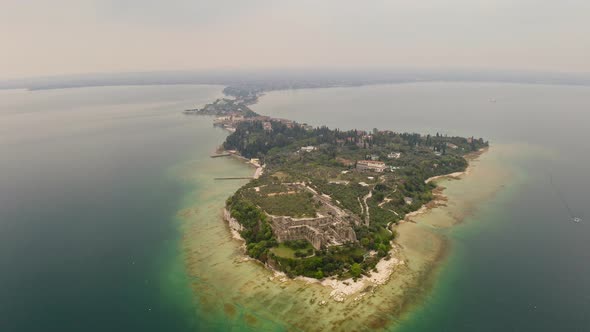 Aerial View Small Island with Historical Archaeological Buildings with Beautiful Sandy Beach on Lake