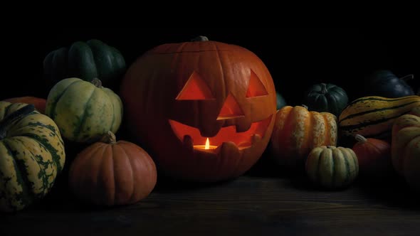 Passing A Halloween Pumpkin On The Table