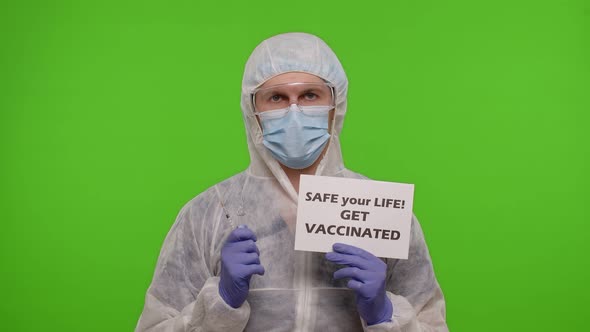 Doctor with Syringe Ampoule and Text Slogan on Paper Safe Your Life Get Vaccinated Coronavirus