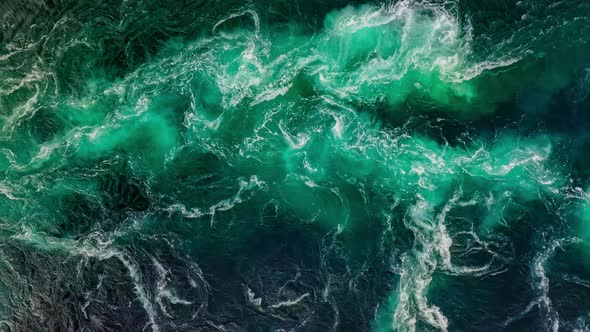 Waves of Water of the River and the Sea Meet Each Other During High Tide and Low Tide