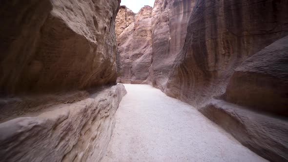 Al Siq Canyon Old Near Water Canal In Ancient City Of Petra To Main Entrance Of The Treasury