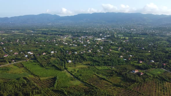 Green Gardens And Mountains In The Village