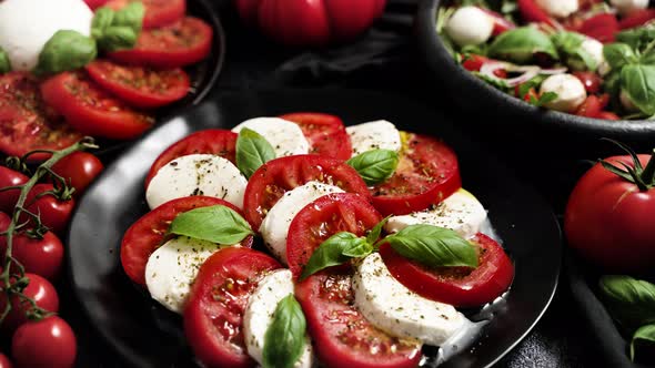 Salads with Traditional Italian Burrata and Mozzarella Cheese with Arugula and Tomatoes