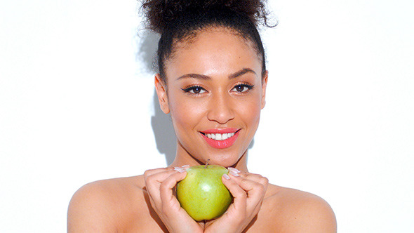 Stunning African American Girl With Green Apple