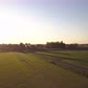 Aerial Cinematic Clip Drone Flying Over a Farm Field During Sunset - VideoHive Item for Sale