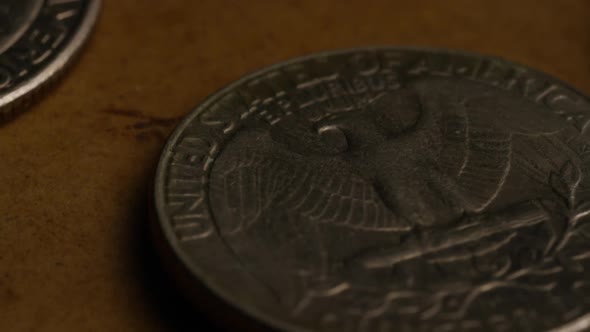 Rotating stock footage shot of American quarters (coin - $0.25) - MONEY 0223