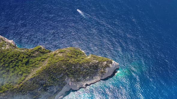 Aerial seascape at the day time. Bay and rocks. Blue water background in the summer.