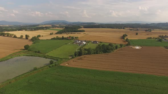 Drone fly ove the lake and fields. High quality  footage